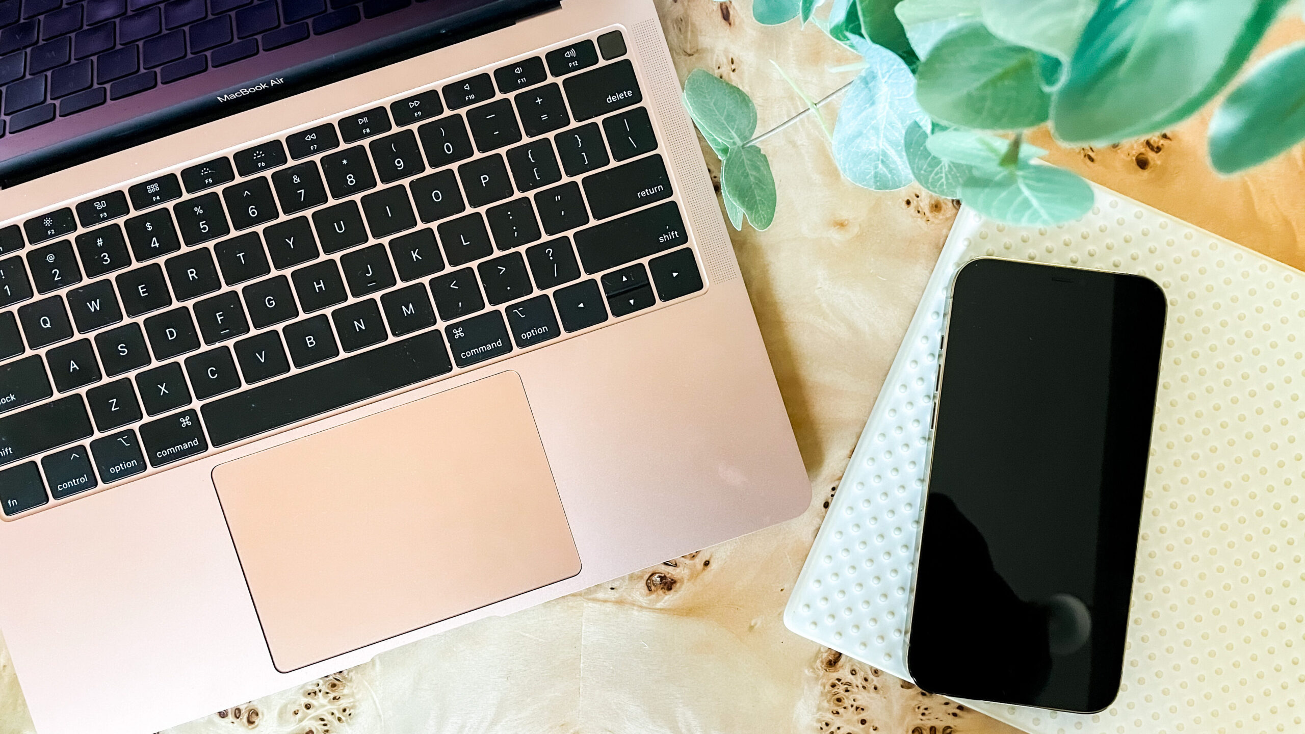 Laptop and phone on counter