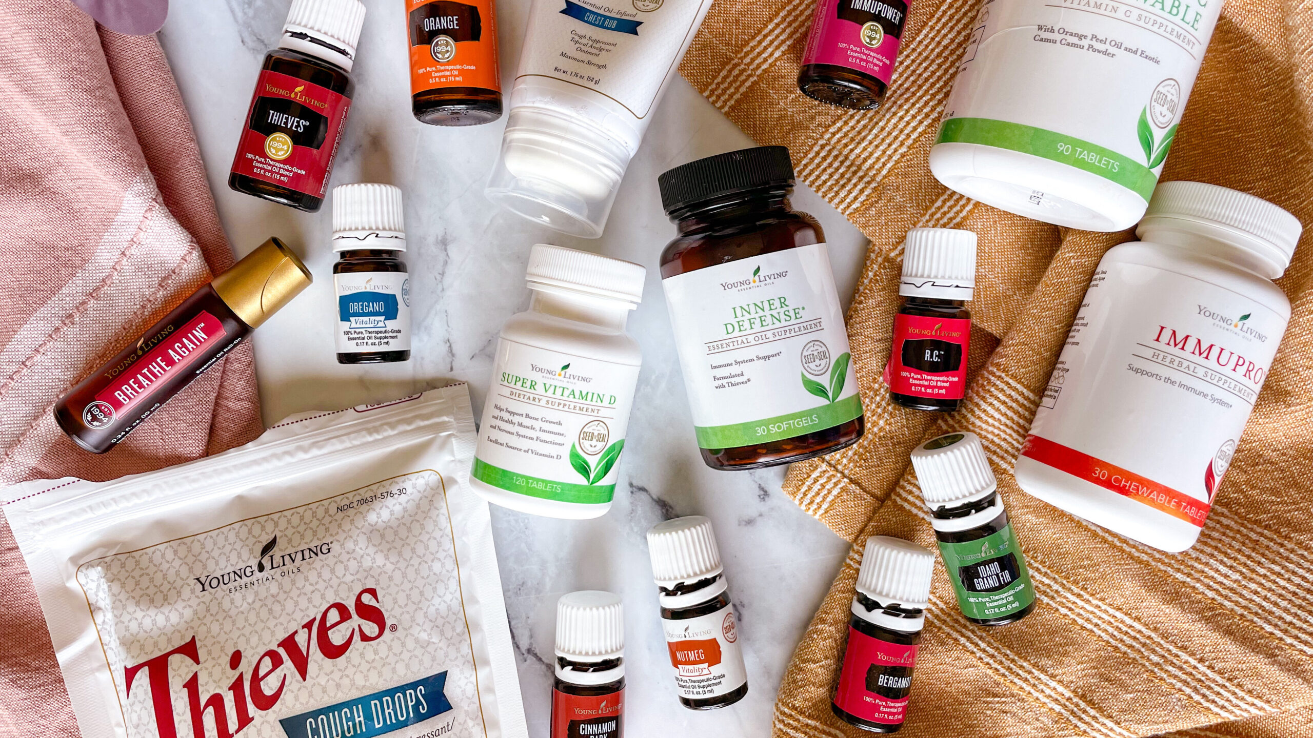 A variety of Young Living essential oils and oil-infused products